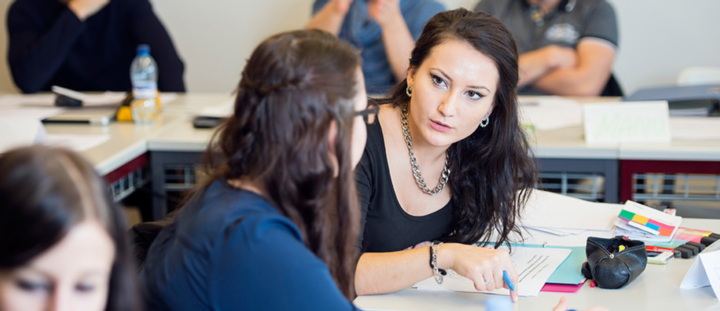 Entrepreneurial Immersion Program Two students working on a project