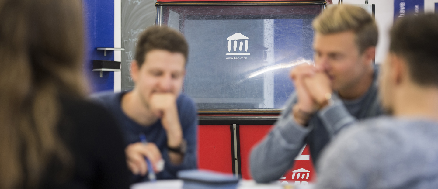 A group of students around a table